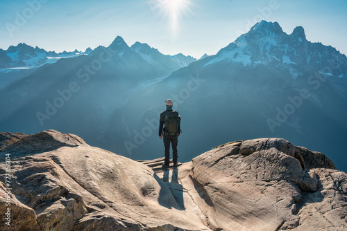 A male hiker enjoying the Mont Blanc mountain view during trail of Lac Blanc at France