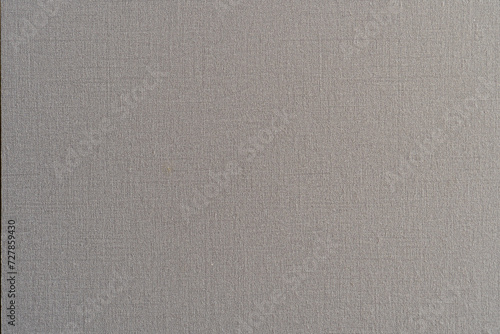 Close up detail of grey fabric texture background. Can be used as wallpaper.