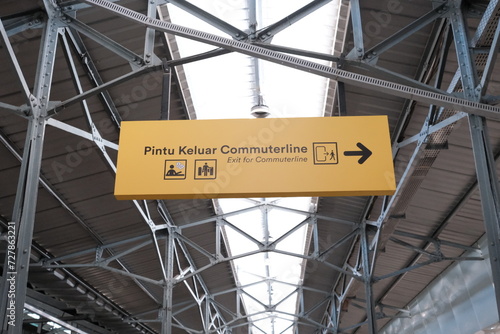 a commuter board sign at the train station