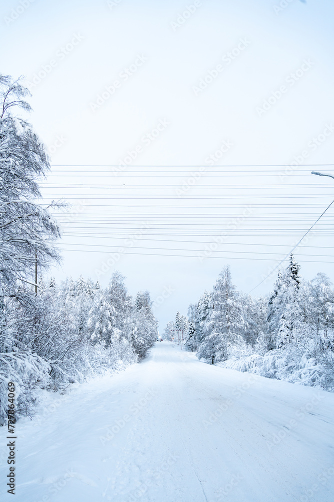 Obraz premium Winter time in snowy Rovaniemi Lapland, winterwonderland shortly before christmas season