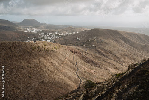 Panoramic view of empty, grey, fields in Lanzarote island, Spain