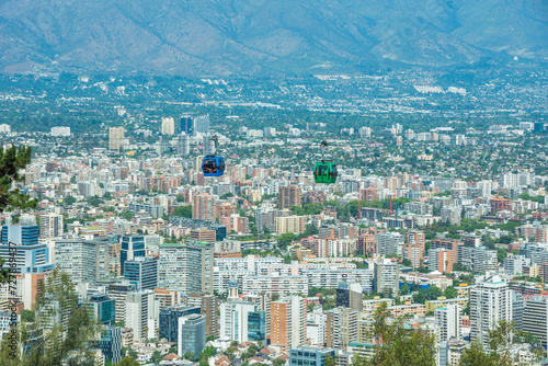 Santiago de Chile, Chile, November, 19, 2023: panoramic view of the city and of some cable cars at Cerro San Cristobal © Bernard Barroso