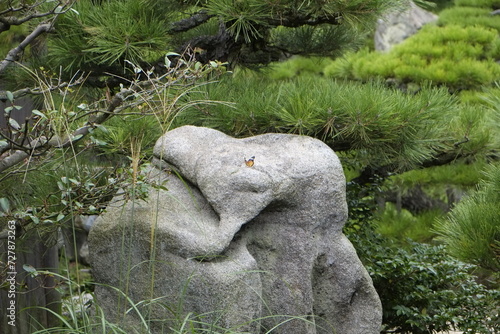 stone statue in a garden
