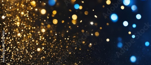 De focused blue gold background of abstract glitter lights. 