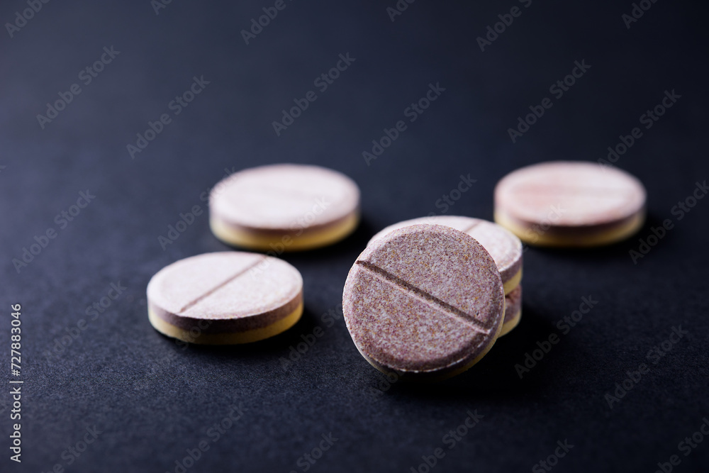 Vitamin effervescent Tablets on paper background. Close up. Copy space. Vitamin effervescent Tablets on paper background. Close up. Copy space.