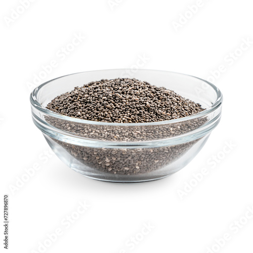 Heap of dried whole chia seeds oval and gray with black and white spots served in transparent glass bowl isolated on white background as food ingredient full of protein, fat, vitamins and minerals