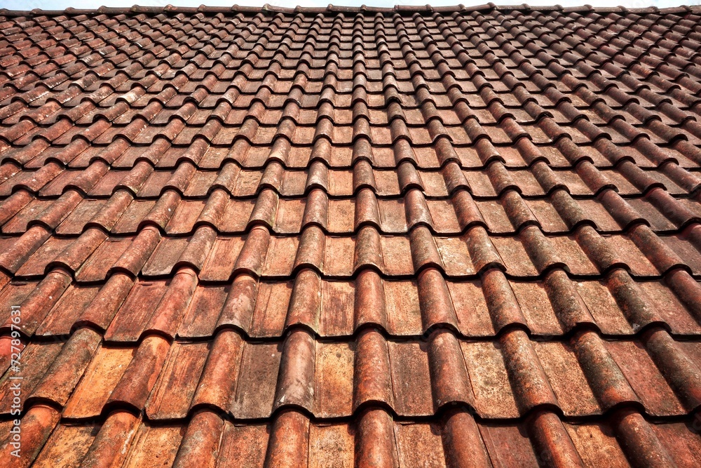 Old red roof tile texture.