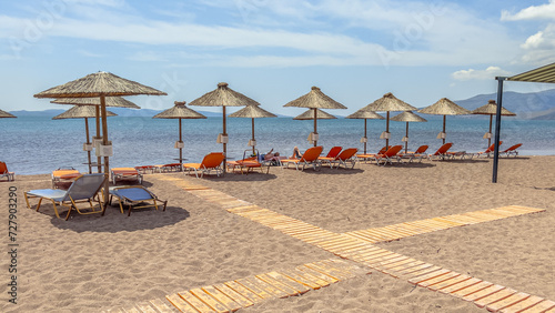 Thatched parasols on beach