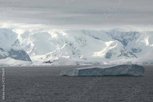 Arctic landscape. Icebergs and global warming. Arctic glacier. Polar Region Antarctica, Climate Change. Ice rapidly melting. Human activities impact on environment, global climate crisis.