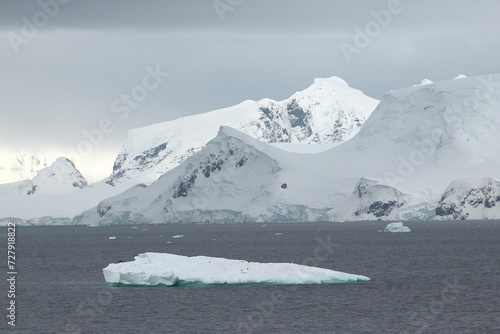 Arctic landscape. Icebergs and global warming. Arctic glacier. Polar Region Antarctica, Climate Change. Ice rapidly melting. Human activities impact on environment, global climate crisis.