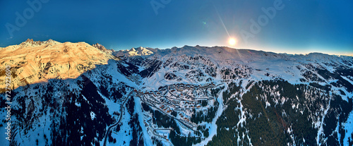 Breathtaking beautiful panoramic aerial view on Snow Alps - winter mountain peaks around French Alps mountains, The Three Valleys: Courchevel, Val Thorens, Meribel (Les Trois Vallees), France photo