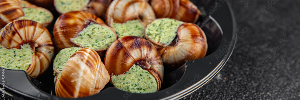 snails green butter aromatic herbs tasty fresh eating cooking appetizer meal food snack on the table copy space food background rustic top view snails green butter aromatic herbs tasty fresh eating cooking appetizer meal food snack on the table copy space food background rustic top view