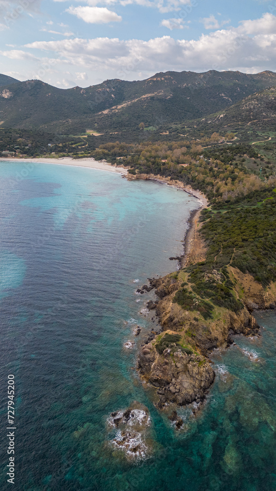 Aerial drone shots of the port of Teulada with Isola Rossa and Tramatzu beach with white sand and crystal clear water.
