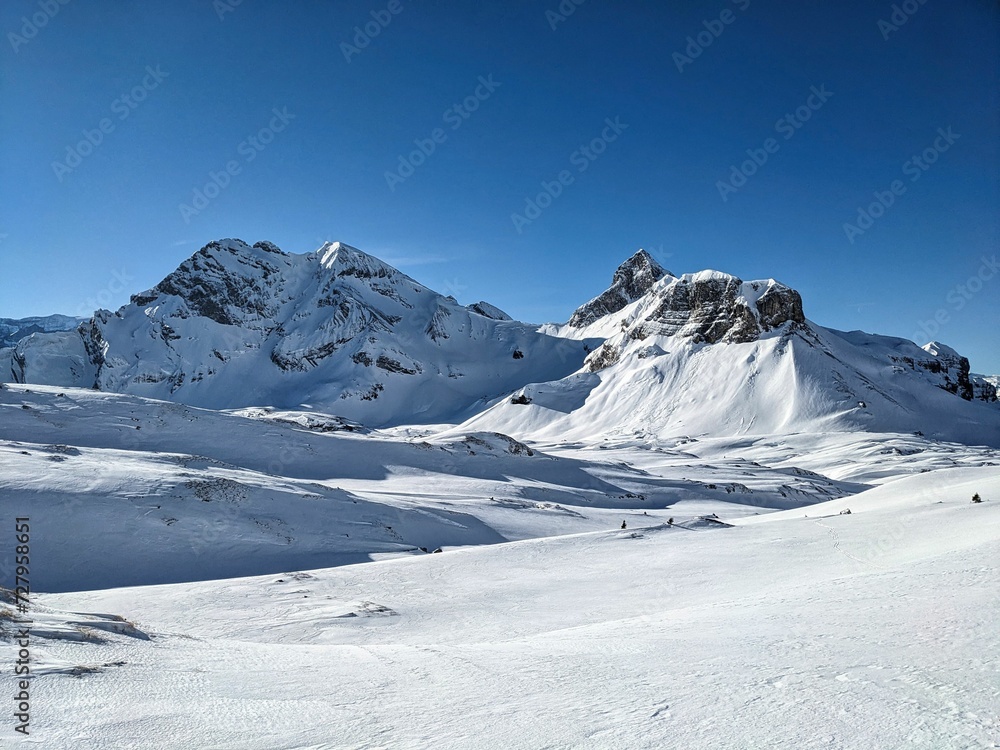 View of the Ortstock mountain in the Braunwald ski area in the Glarus Alps. Ski mountaineering in beautiful Switzerland.