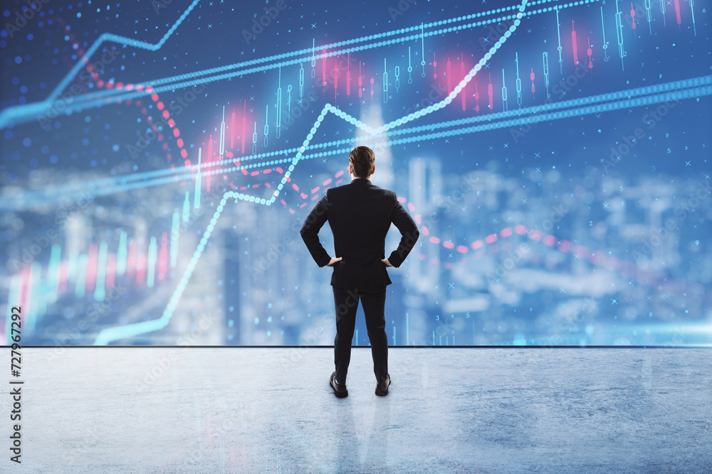 Back view of small young male with hands on sides standing on blurry city background with forex chart hologram. Success, finance, trade, future and tomorrow concept. Double exposure. Back view of small young male with hands on sides standing on blurry city background with forex chart hologram. Success, finance, trade, future and tomorrow concept. Double exposure.