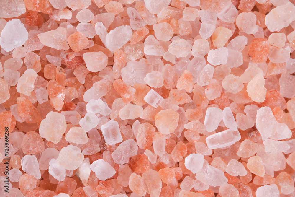 Background, pink edible Himalayan salt closeup. Background, pink edible Himalayan salt closeup.