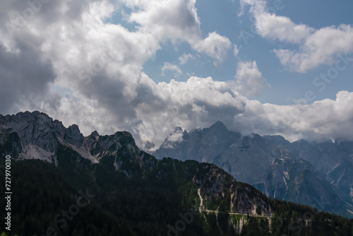 Scenic view of mountain peak Jof Fuart in untamed Julian Alps seen from summit Cima del Cacciatore, Monte Santo di Lussari, Friuli-Venezia Giulia, Italy. Wanderlust in remote Italian Alps in summer