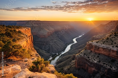 Golden Sunset Over River Carving Through Canyon Cliffs
