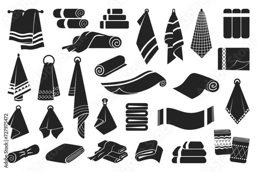 Black towels icons. Towel for bathroom and kitchen. Household fabric accessories in roll, pile and on wall. Tissue neoteric vector silhouettes