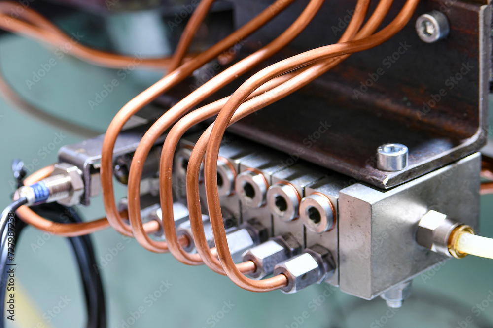 Copper pipes of the pressure distributor of the hydraulic oil station