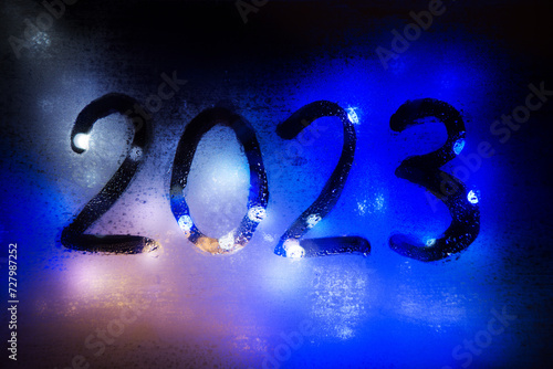 New year background of misted glass. 2023 numbers photo