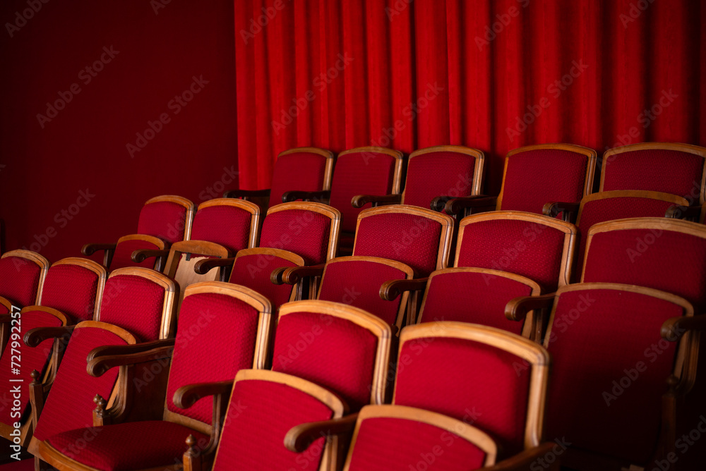 Fototapeta premium red empty seats for spectators in the theater or cinema