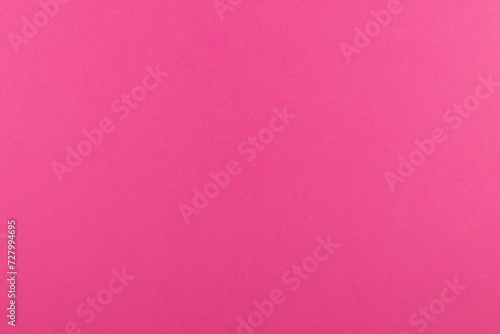 Panorama de fond uni en papier rose vif pour création d'arrière plan.	 photo