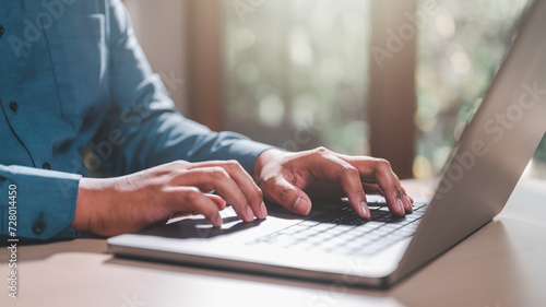 business, finance, investment, financial, document, report, budget, account, accounting, analysis. hands of young contemporary office manager over laptop keypad during work over new business project.