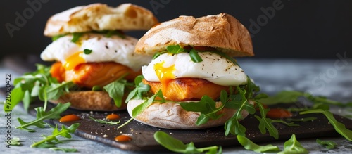 Delicious Red Fish Sandwich with Poached Egg - A Mouthwatering Twist on a Classic Fish Sandwich, Featuring a Perfectly Poached Egg and Vibrant Red Fish photo