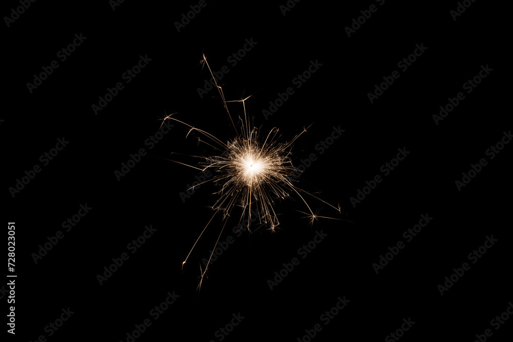 Fototapeta premium Fireworks bengal Flicker on a dark background. Easy to add lens flare effects for overlay designs or screen blending mode to make high-quality images.
