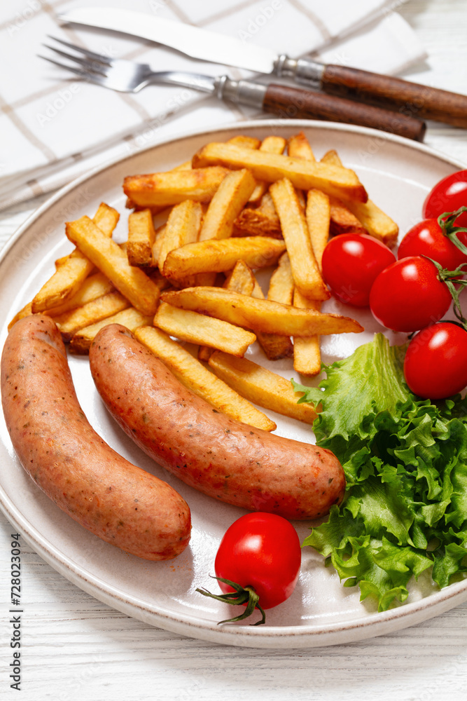 sausages with potato, lettuce, tomatoes, top view sausages with potato, lettuce, tomatoes, top view