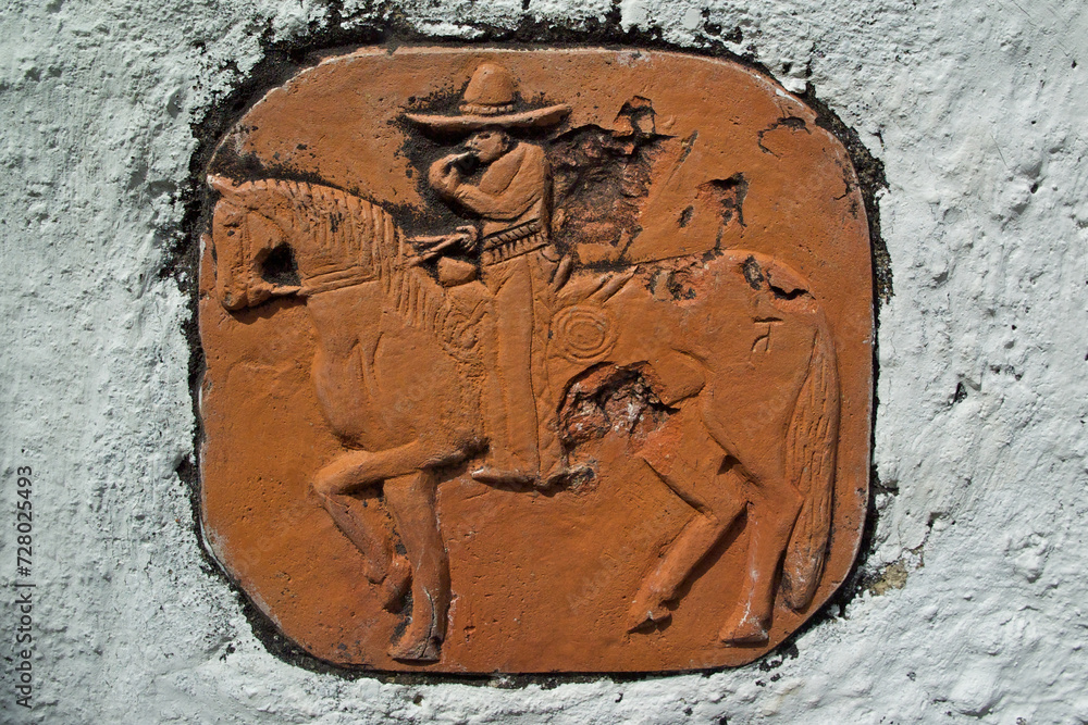 Obraz premium Old tile edited for modesty by chiseling off genitalia of horse, Mission San Miguel Arcángel, San Miguel, California