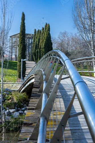 puente tubular sobre el rio manzanares en madrid en el parque del manzanares photo
