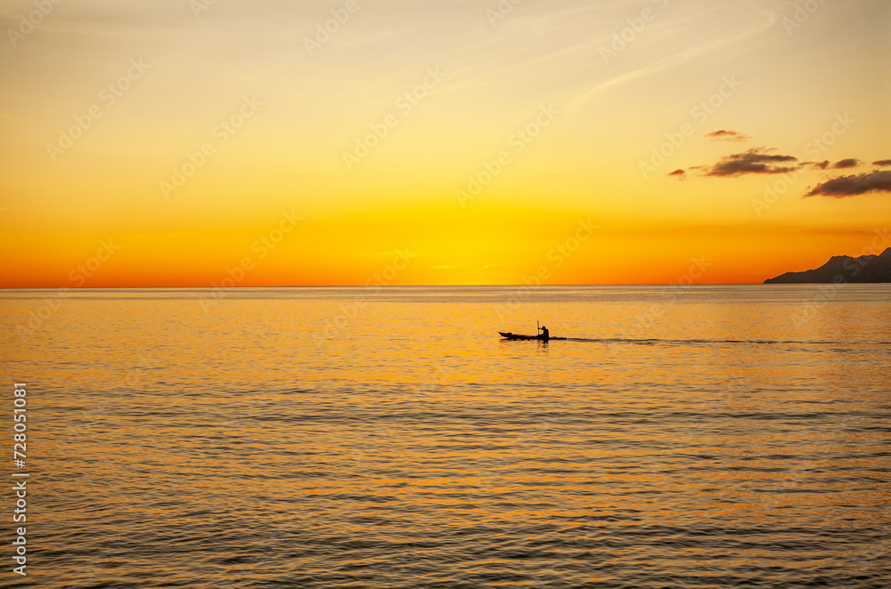 Kayaking at sunset near Beau Vallon Beach, Island Mahé, Republic of Seychelles, Africa. Kayaking at sunset near Beau Vallon Beach, Island Mahé, Republic of Seychelles, Africa.