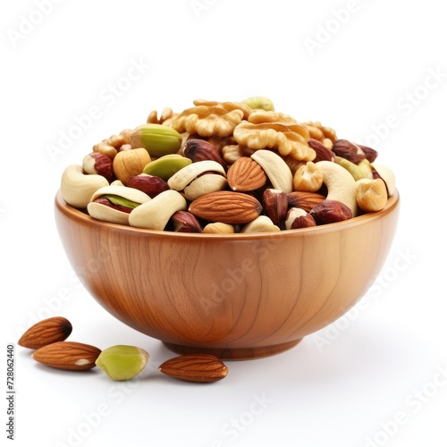 Wooden Bowl full of nuts dry fruits isolated on white background