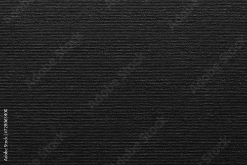 Black corrugated craft paper texture as background 