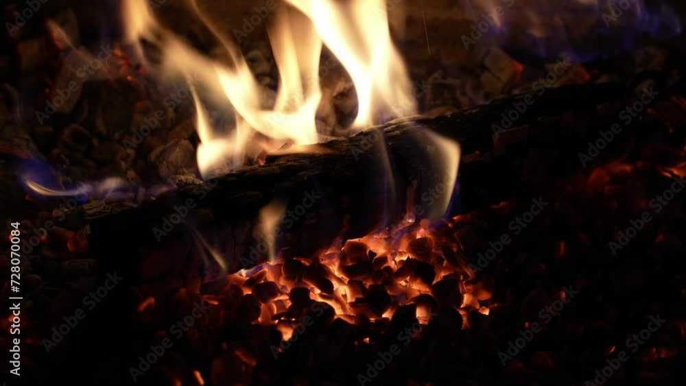 Flying Embers from fire. Burning hot bonfire sparks. Fire Particles over black background with smoke. Torch fire, camp fires, fire and flames. Flying Embers from fire. Burning hot bonfire sparks. Fire Particles over black background with smoke. Torch fire, camp fires, fire and flames.