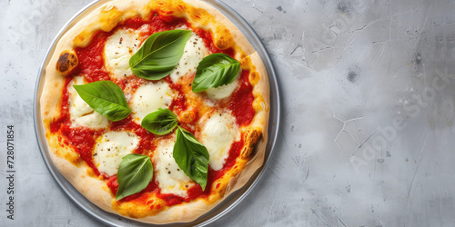 Classic Margherita Pizza with Fresh Basil. Freshly baked Margherita pizza with tomato sauce, mozzarella cheese, and basil leaves, close-up, top view, copy space.