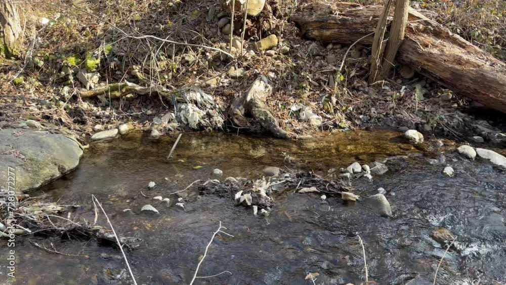 small water stream with plastic waste and garbage small water stream with plastic waste and garbage