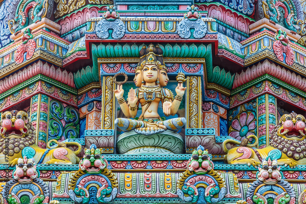 Colored decorations and statues on the exterior of the Hindu Temple Sri Maha Mariamman Temple (