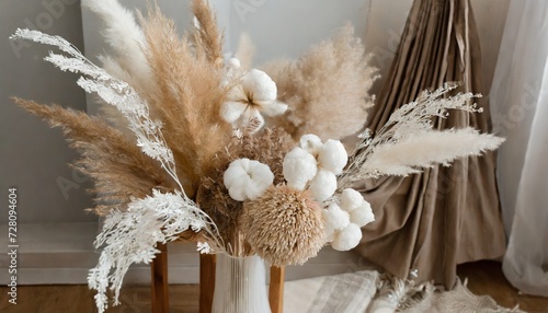 pampas grass and lunaria are collected in a bouquet for room decor bouquet of dried flowers floral minimal home interior boho style boho style holiday photo zone decor photo