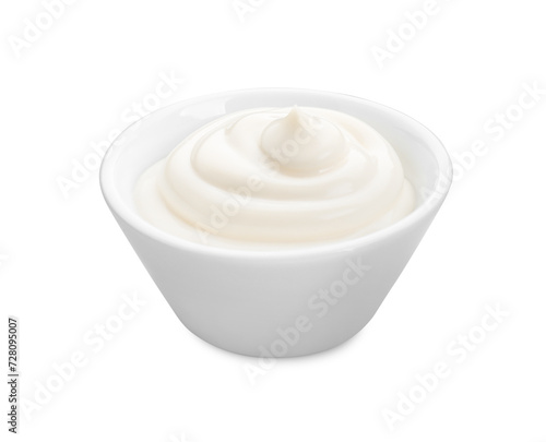 Tasty mayonnaise sauce in bowl isolated on white