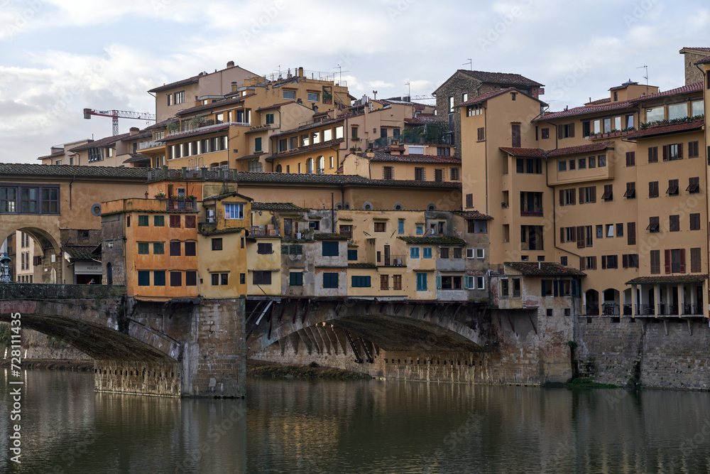 Scenic view of the Ponte Vecchio medieval stone bridge in Florence, Italy.