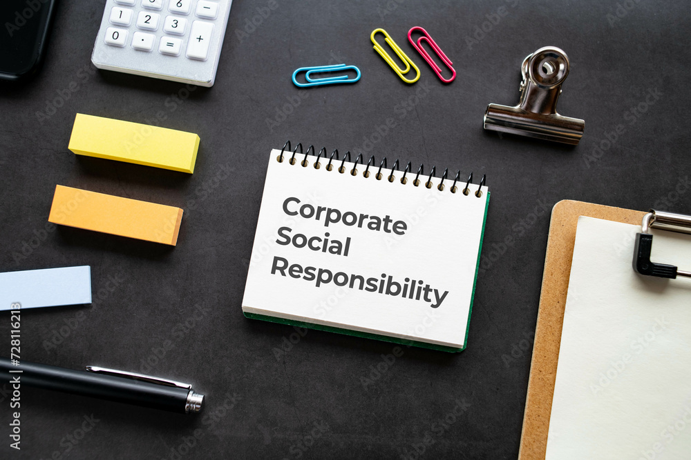 There is notebook with the word Corporate Social Responsibility. It is as an eye-catching image. There is notebook with the word Corporate Social Responsibility. It is as an eye-catching image.