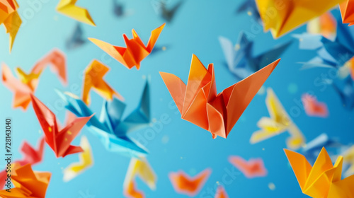 A celebration of simplicity and elegance origami shapes appear to float effortlessly against a backdrop of bright bold colors creating a strikingly minimalistic yet strikingly