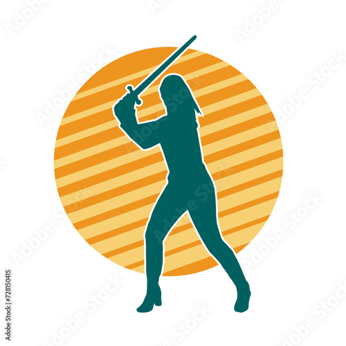 Silhouette of a female fighter in action pose carrying sword weapon.
