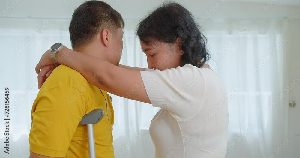 Embracing couple shares a heartfelt hug in a minimalist white room, emotions visible on their faces Embracing couple shares a heartfelt hug in a minimalist white room, emotions visible on their faces