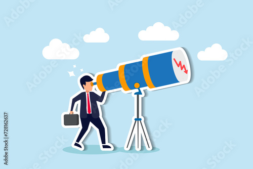 Predict stock market downfall, foresee economic crisis or market crash concept, panic businessman investor look through telescope to see stock market red downward bearish graph.