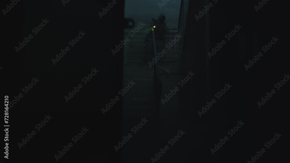 Two soldiers on the abandoned stairway of the military building Two soldiers on the abandoned stairway of the military building