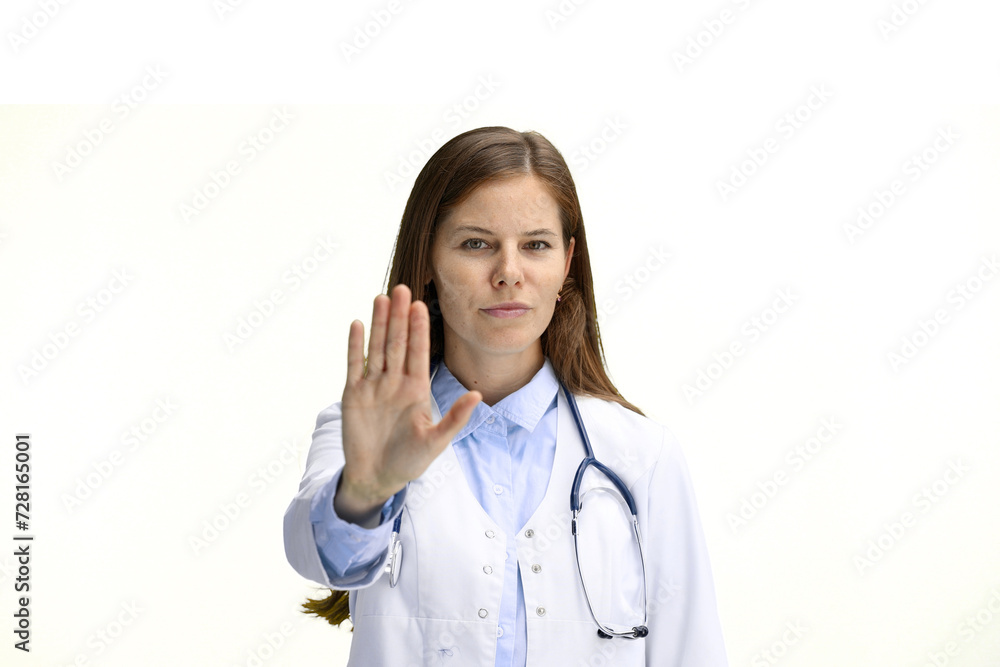 Female doctor, close-up, on a white background, shows a stop sign Female doctor, close-up, on a white background, shows a stop sign